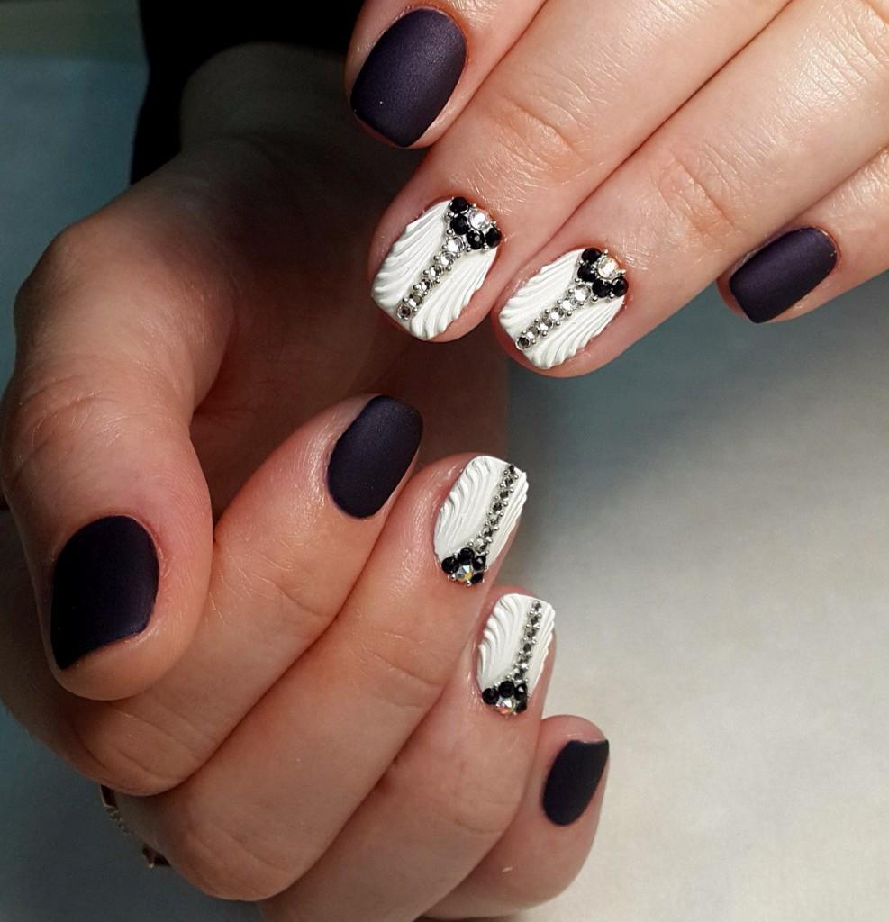 black and white manicure with rhinestones