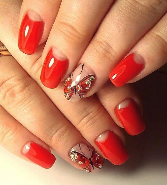 red nails with rhinestones