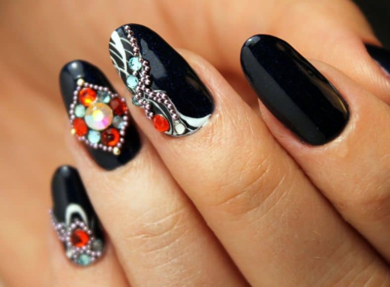 black manicure with rhinestones